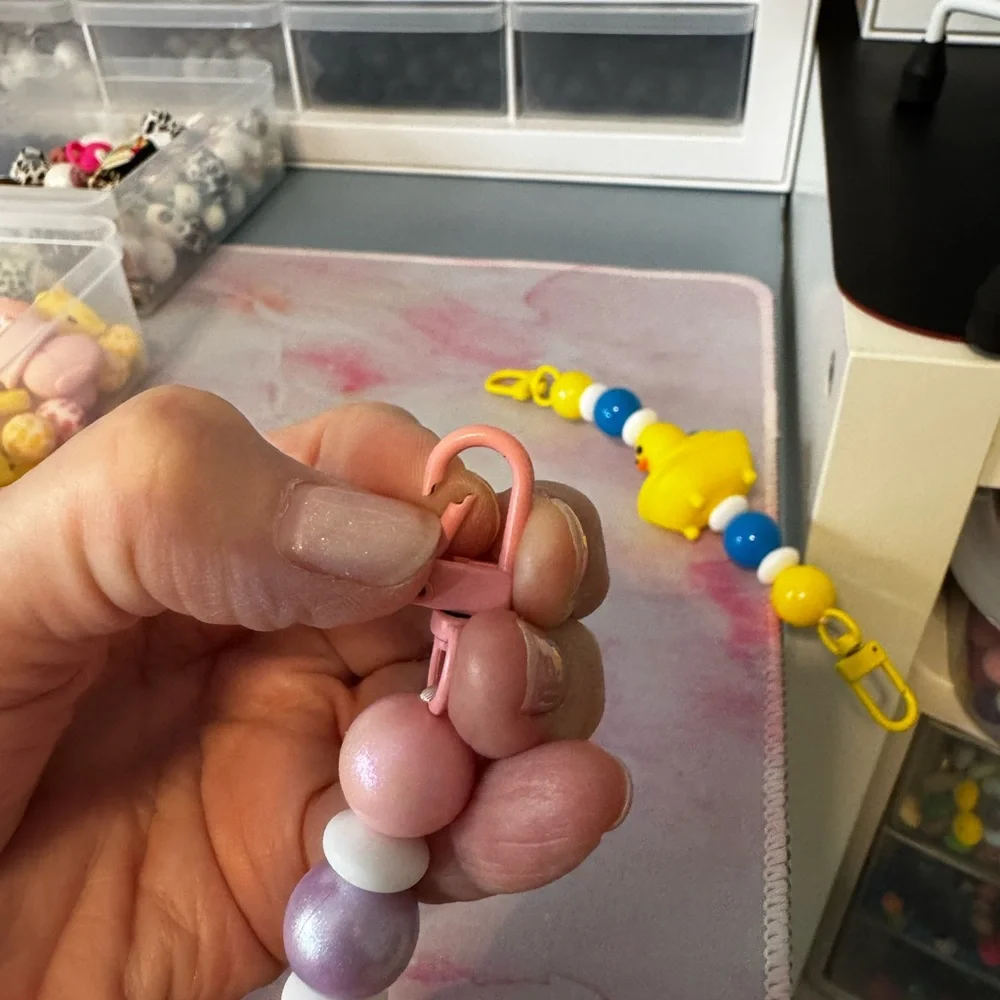 Just ducking around tablet or phone charm holders.